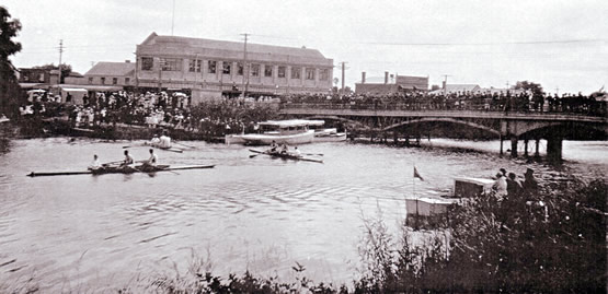 A river regatta in 1922 with the newly completed store in the background. River Regatta 1922