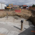 Concrete floor around piles